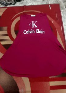 Korean Maroon Cute flowy top [Crop from front, long in back]