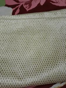White And Golden Fabric