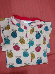 (Max) Cream Base With Pink,Teal,Mustard, And Blue.