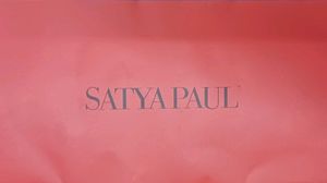 Satya Paul tie with an Amity tag. New.