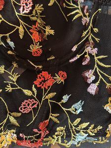 Elegant embroidered net corset.