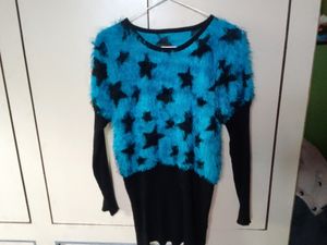 It's a partywear blue warm top 💙!
