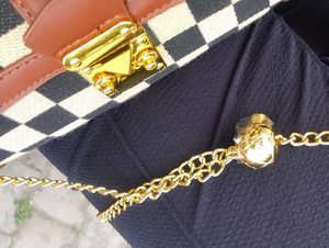 Sling Bag With Chain.
