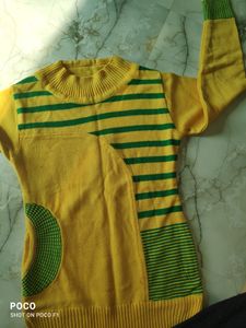 pretty yellow sweter with side pocket.