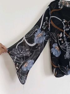 Branded floral sheer top with attached camisole