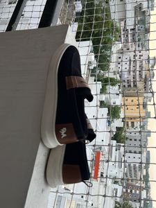 Neeman’s Unisex Black Slip Ons