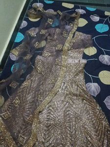 lehenga with small pipes like beads.