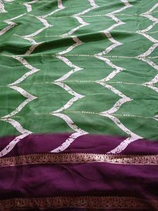 Green,Georgette With Maroon Border.