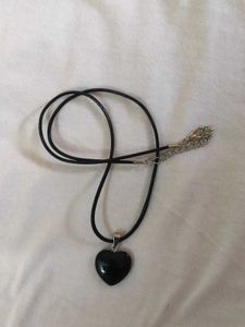Black Heard Shaped Pendant And Faux Leather Chair