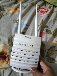 Airtel Broadband Postpaid Adaptor And Receiver.