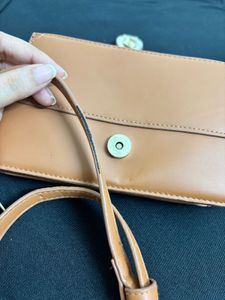 Tan Brown Slingbag With Hand Held