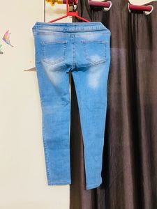 Select Skinny Distressed Jeans