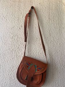 Leather Sling Bag With Hand Work On It
