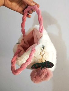 Plush Pink Handbag with Charm