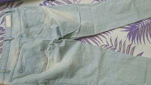 Ice Blue Colour Ripped Jeans