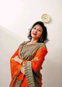 Elegant Orange Printed Saree with Floral and Geome