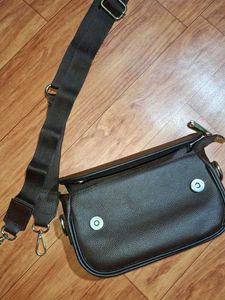 brown sling bag
