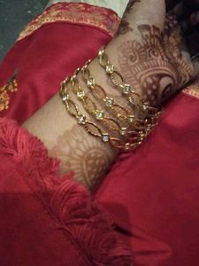 Golden Bangles With White Stone