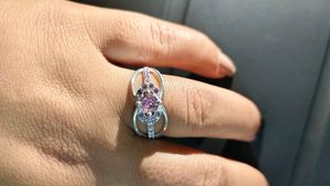 pure silver ladies ring with american diamond