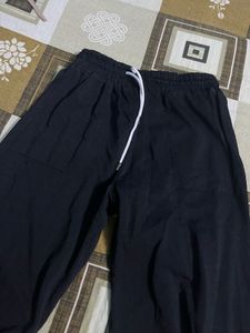 black jogger with side cut design