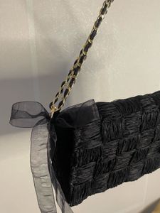 Chic Black Woven Clutch Bag with Chain Strap
