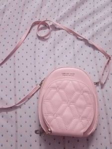 COMBO Of sling bag pink colour And Guess Watch