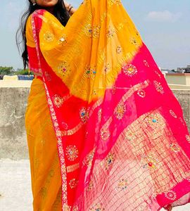 one time used saree with yellow and pink colour
