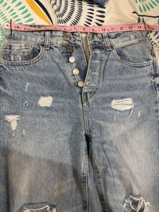 2 Pair Of Ripped Wide Leg And Straight Jeans