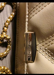 Lino Perros Quilted Sling Bag