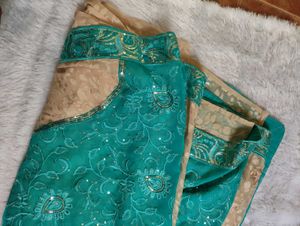 CREAM AND TURQUOISE GREEN SAREE