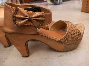 Gold Heels with Bow Detail