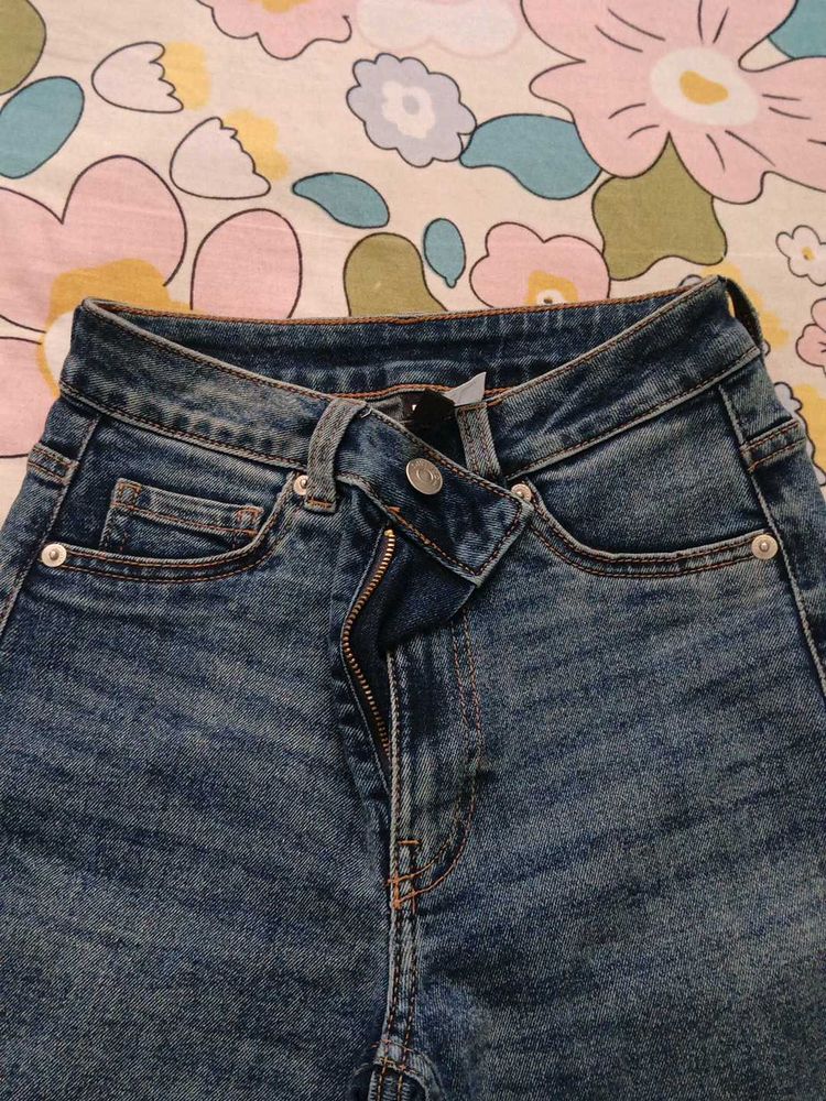 Cross-Waist Denim Jeans