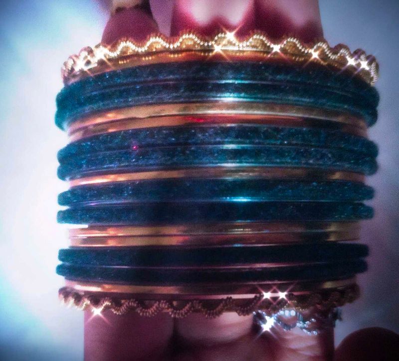 golden and black bangles