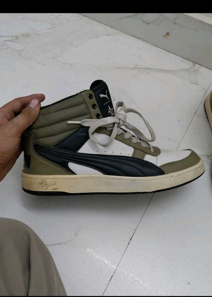 Stylish Puma high-top sneakers