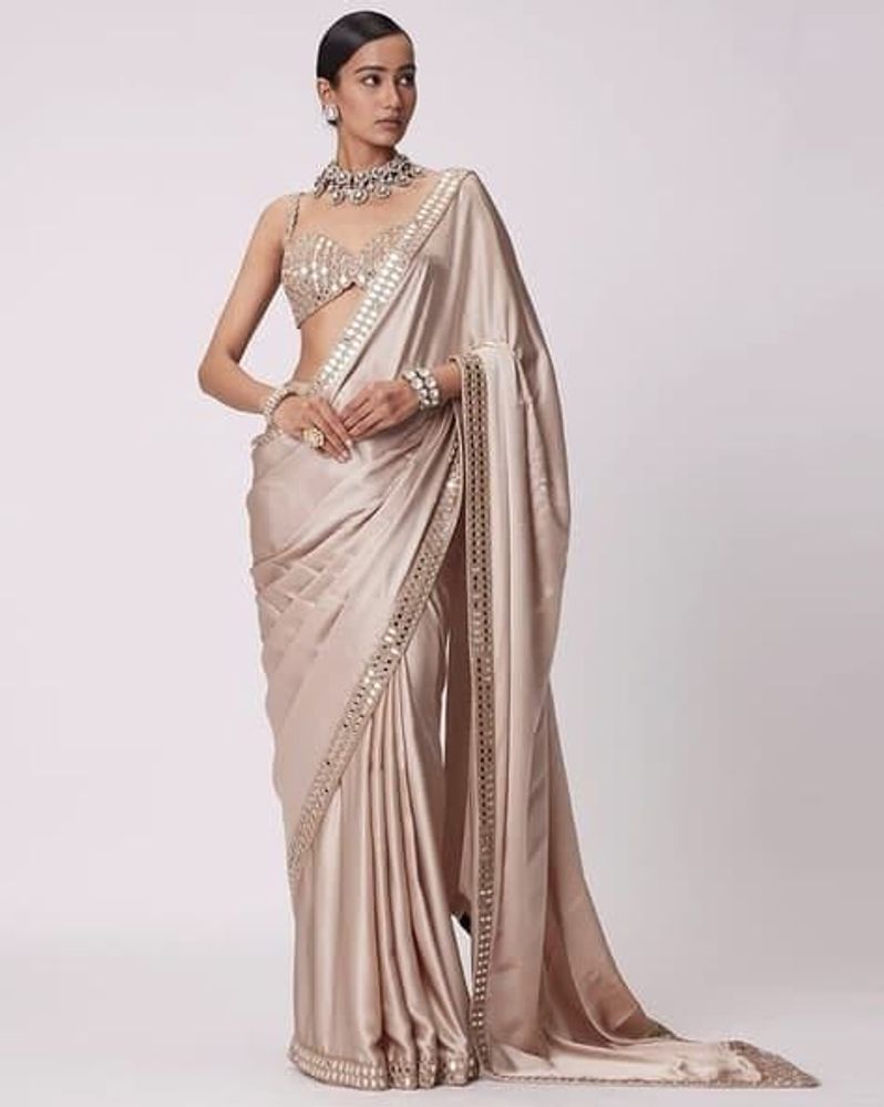 Elegant Beige Embellished Saree