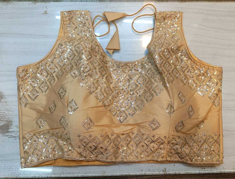Sleeveless Gold Blouse