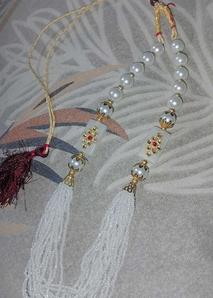 Elegant Pearl and Tassel Necklace
