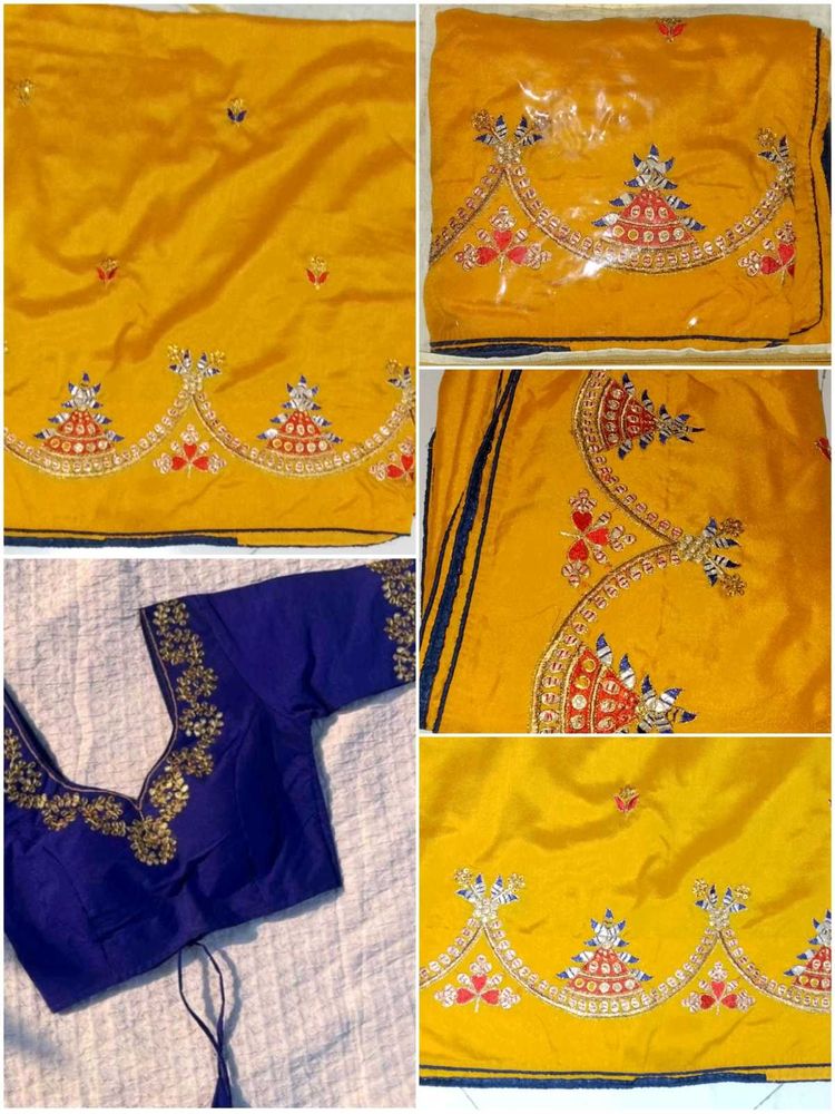 wedding wear yellow saree with nevy blouse
