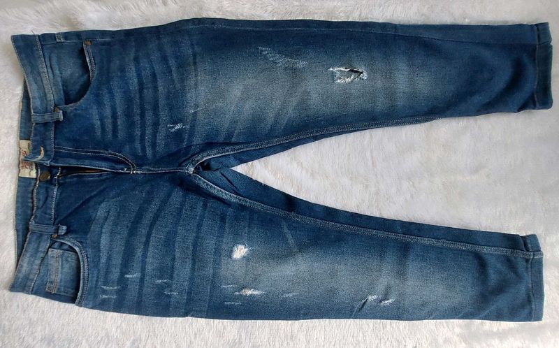 Distressed Denim Jeans