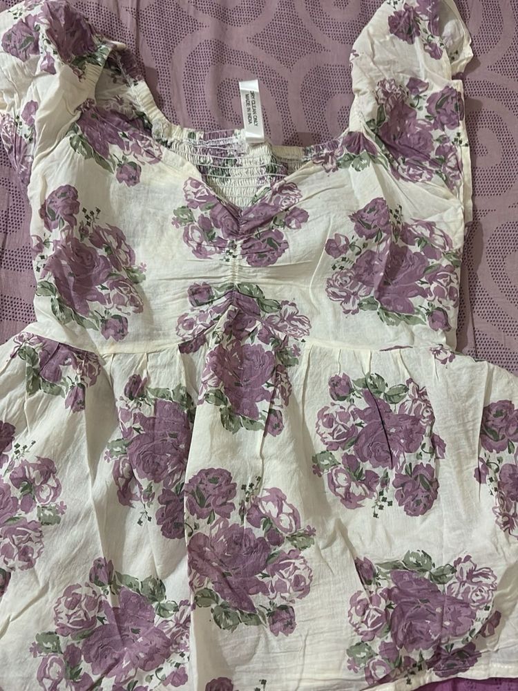 It Is Peplum Top With Rose Print
