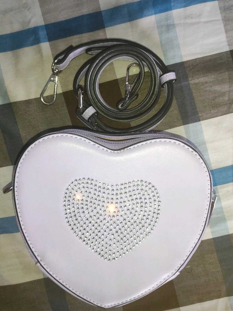 heart shape sling bag