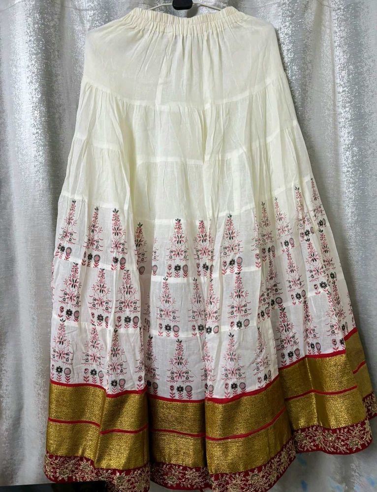 White Skirt With Red Print And Embroidery Border