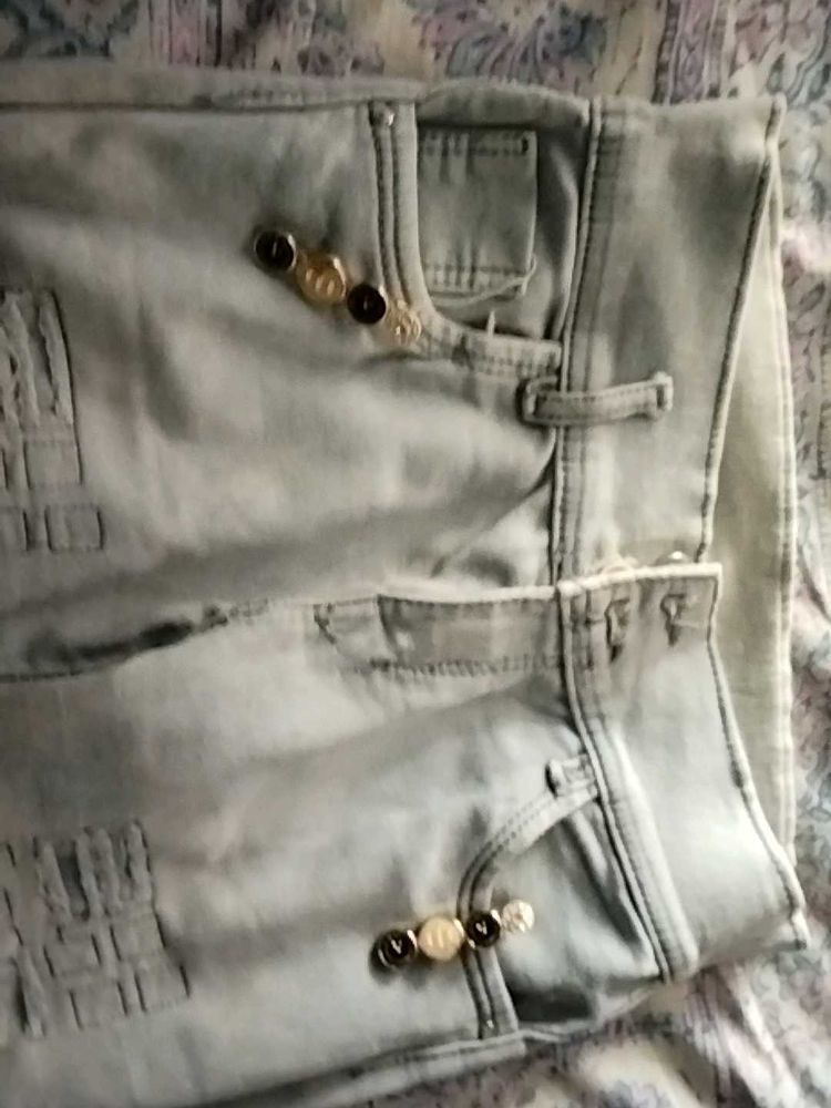 Distressed Jeans with Button Detail