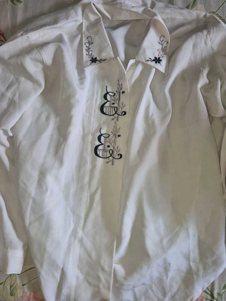 cute white shirt with embroidery