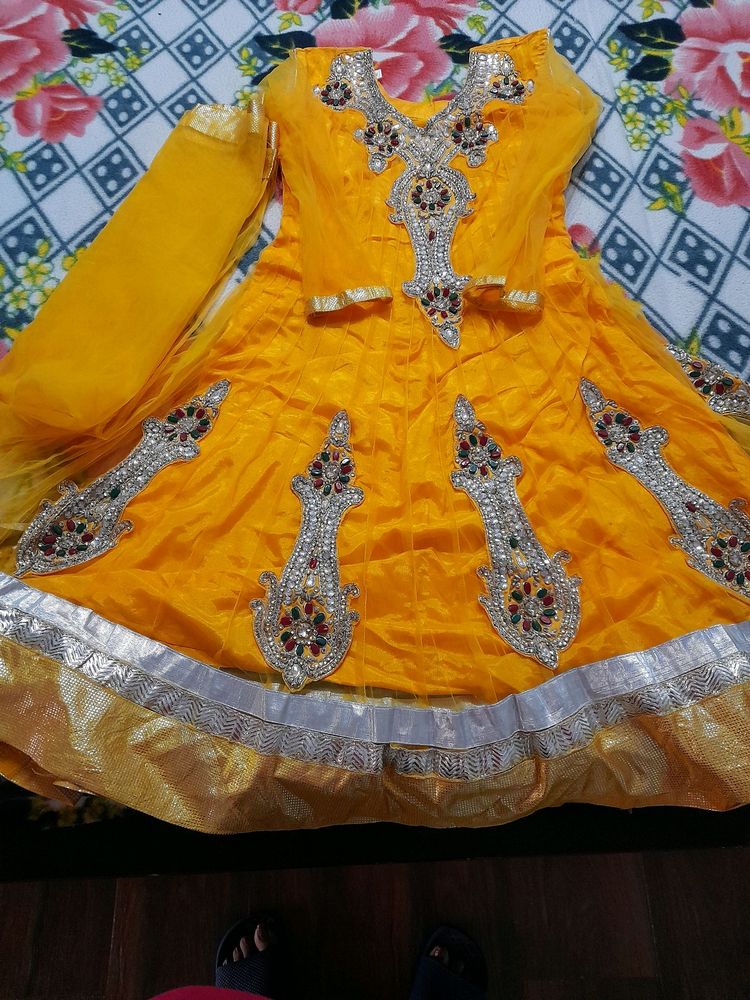 Yellow party wear heavy embroidery frock suit
