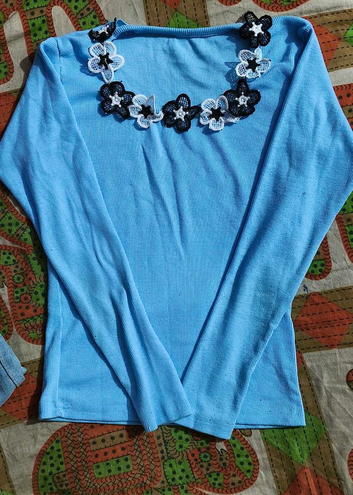 Light Blue High-Waisted Jeans And Bule Top