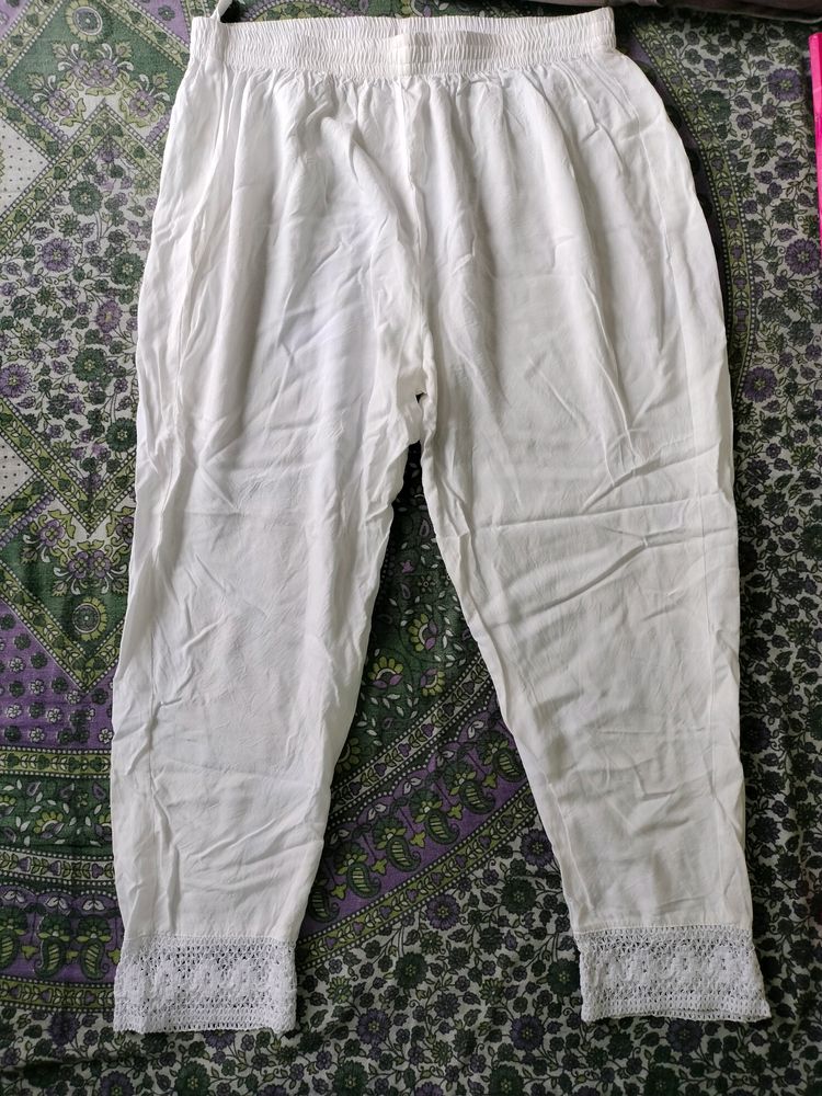 White Cigrette Pant With Lace Border At Bottom