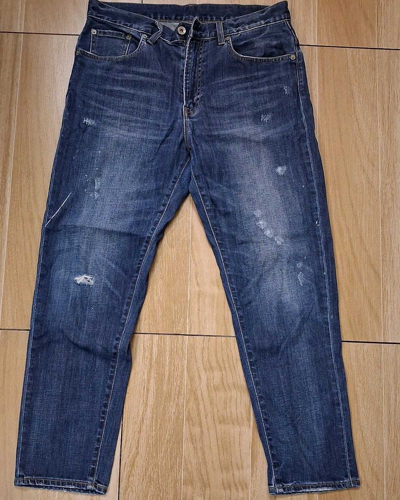 Distressed Blue Denim Jeans
