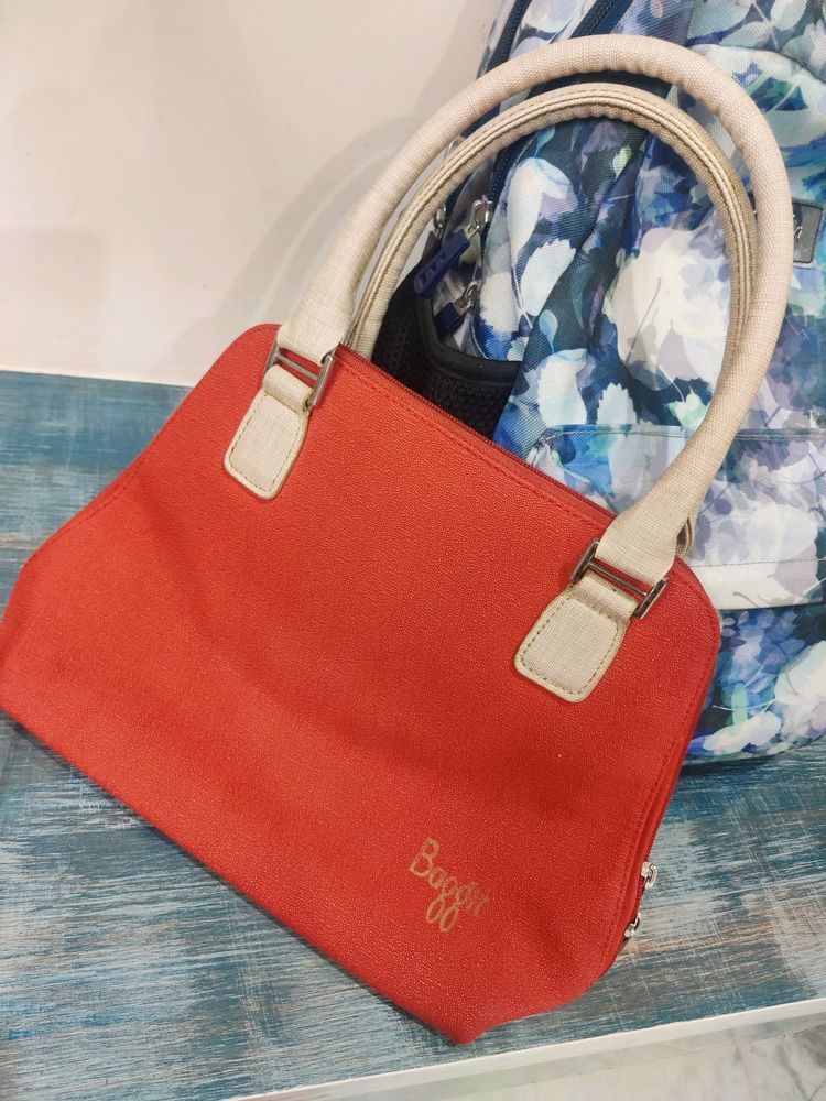Baggit Red and beige hand bag