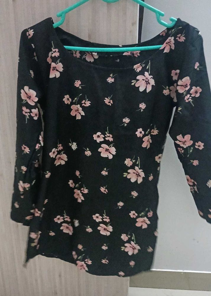 Black Short Kurti With Printed Flower On It